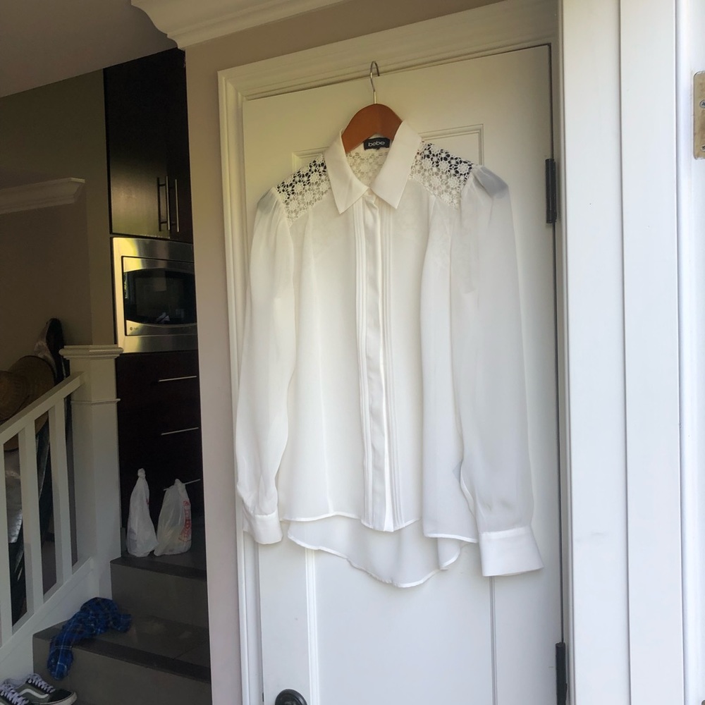 Worn once. Like new beautiful sheer blouse